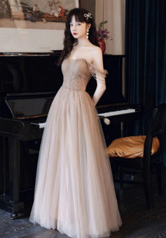 A Line Champagne tulle prom dress with beading