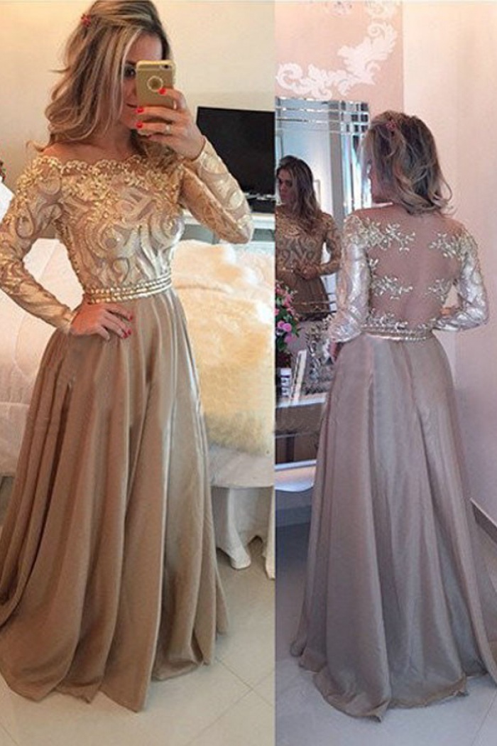 gold dress with long sleeves