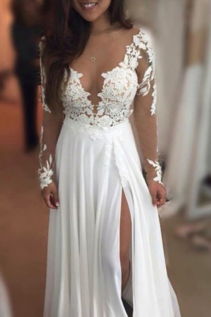 white floor length dress with sleeves