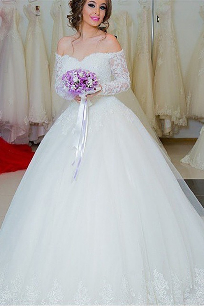 white lace wedding dress with sleeves