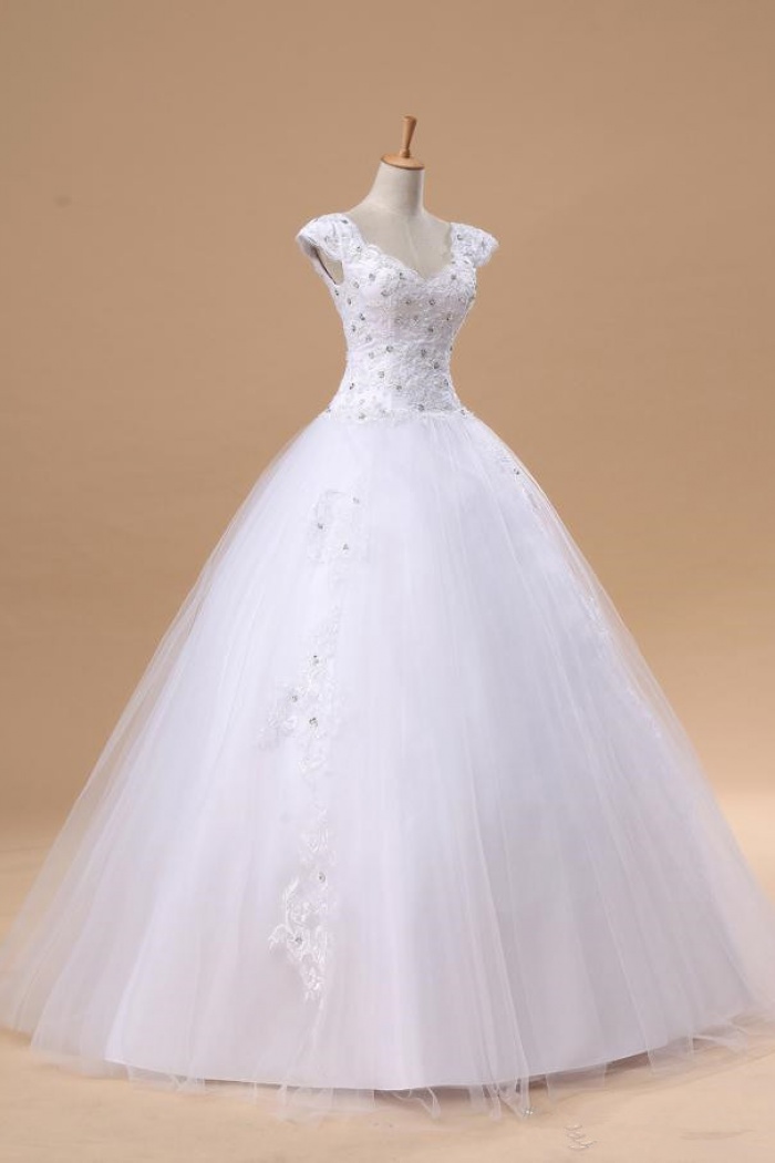 white puffy wedding dresses