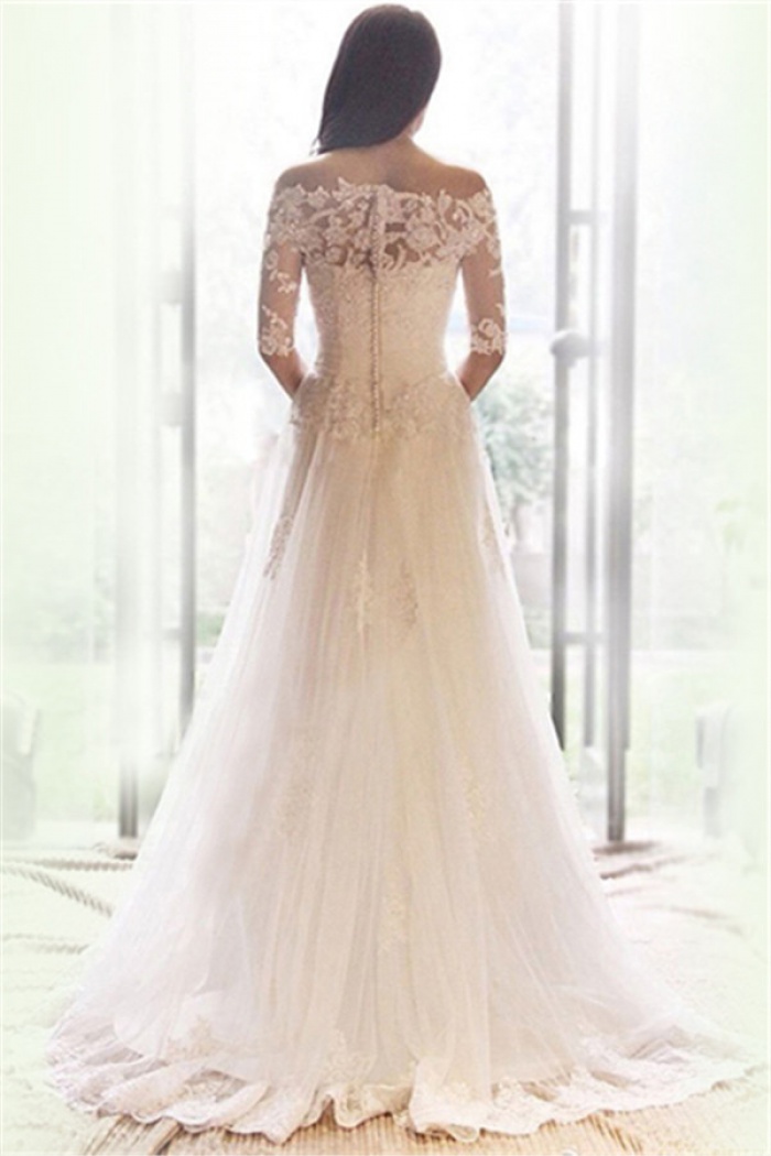 white lace off the shoulder wedding dress